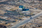 Single house built to stronger codes remains standing in its neighborhood on the Bolivar Peninsula in Texas following Hurricane Ike. Inland flooding due to storm surge and erosion.