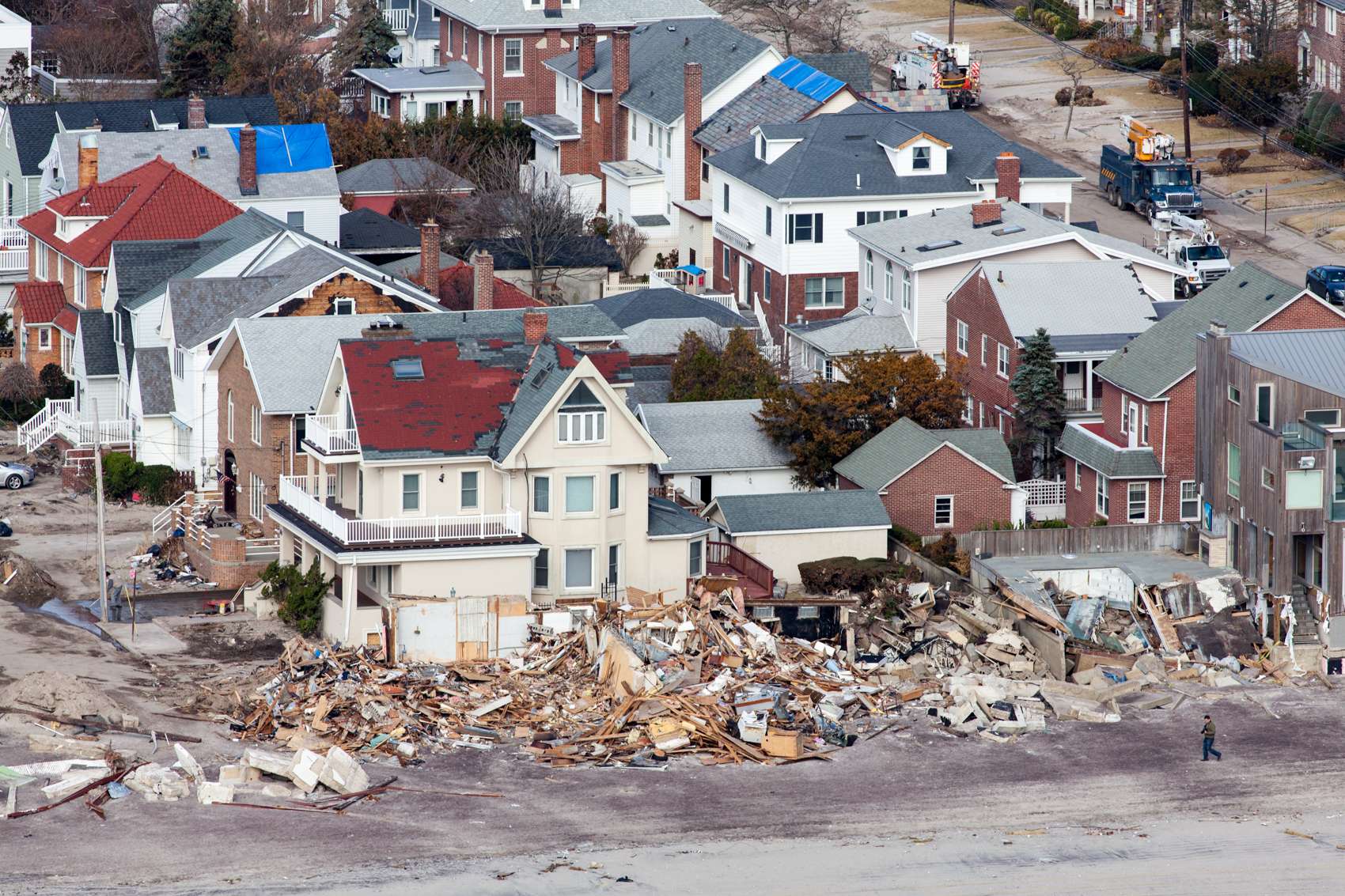 Front row ocean housing completely destroyed by Hurricane Sandy. (Note the roof damage buildigns.)
