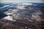 Tar sands mines and facilities in Alberta are among the largest industrial activities on Earth. The Syncrude Mildred Lake mine, on the banks of the Athabasca River (upper left), measures more than ten miles across.