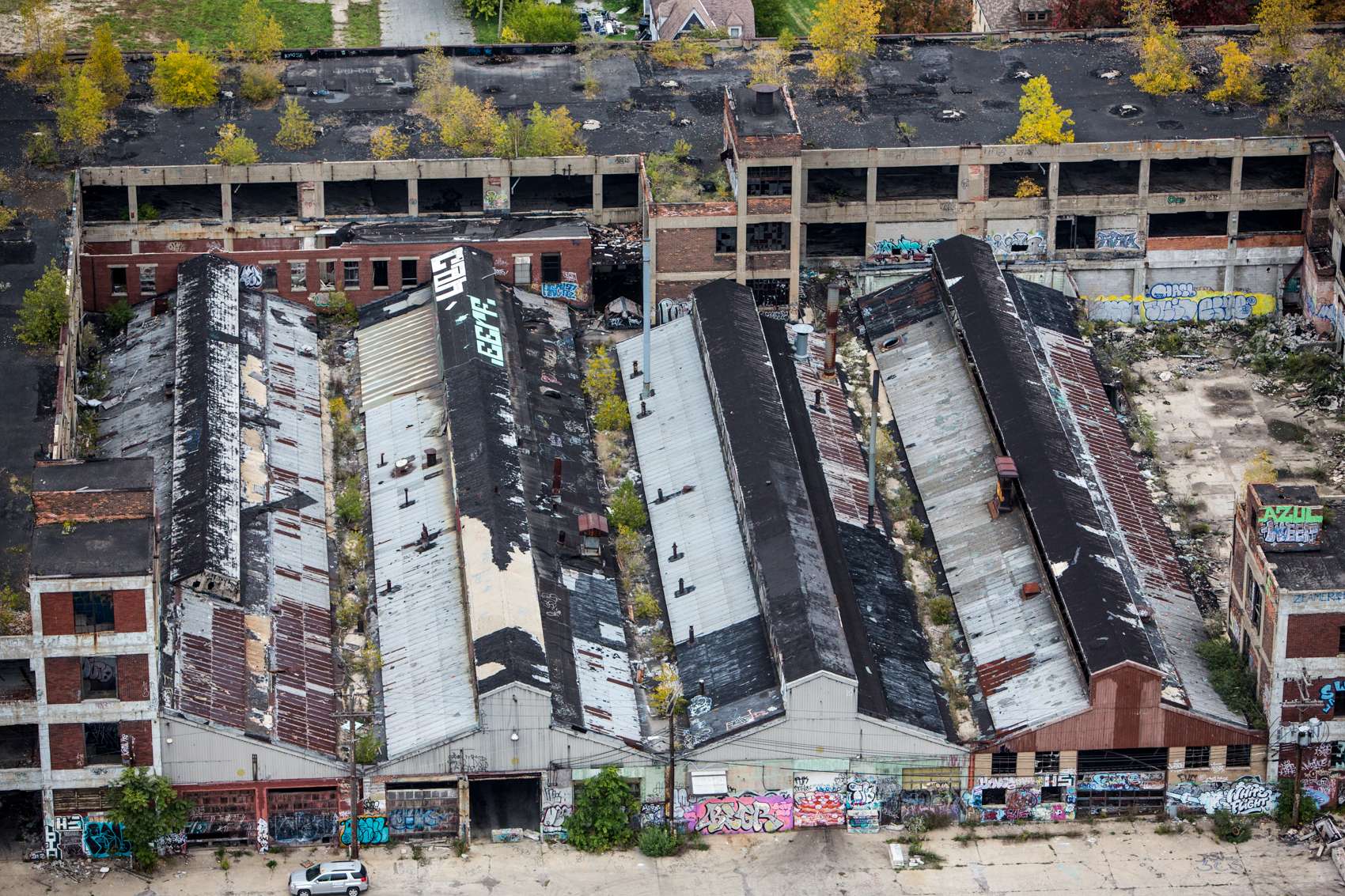 The Packard Automotive Plant, built in the early 1900s, is now in ruins. At over three million square feet, it was regarded as one of the most sophisticated production facilities of its kind when it opened in 1903.