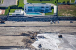 Using public money, excavators work to replenish sand and widen the beach in front of a Deal, New Jersey home which sold for close to 20 million USD in 2018.