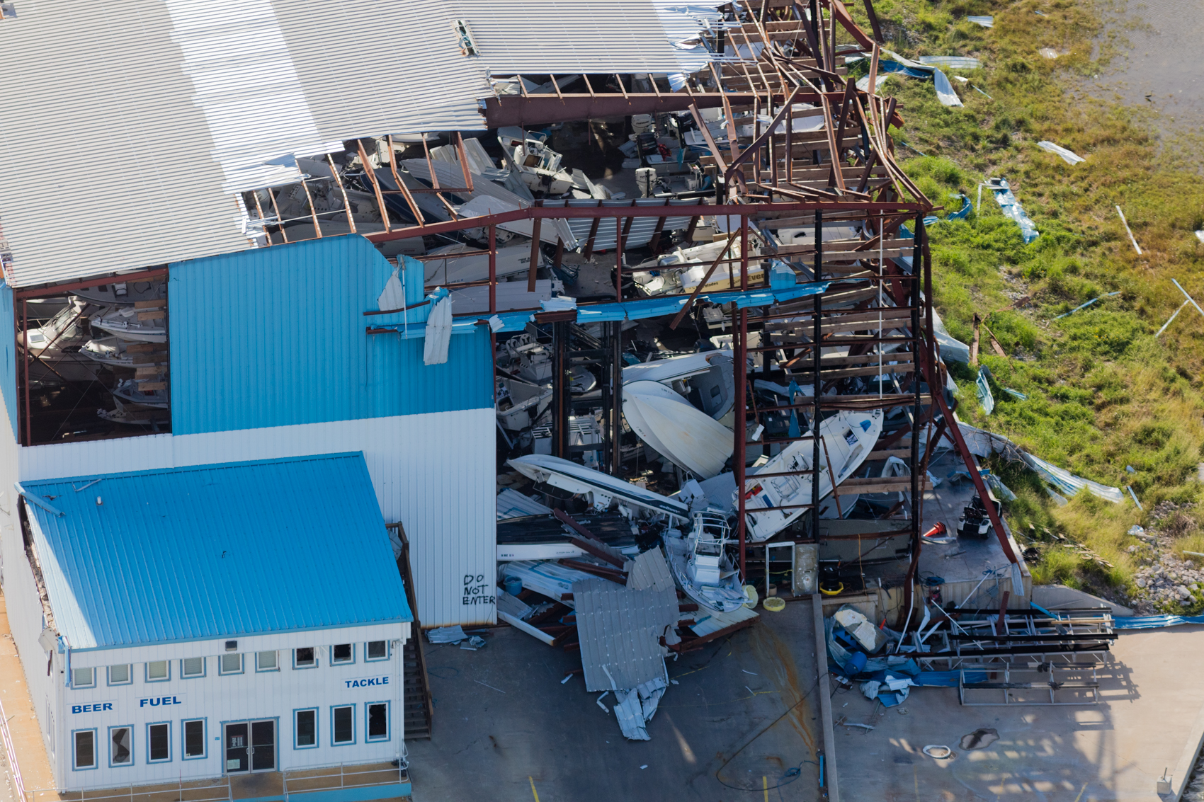 Racks storing boats at a private marina in Rockport, Texas collapsed during Hurricane Harvey.