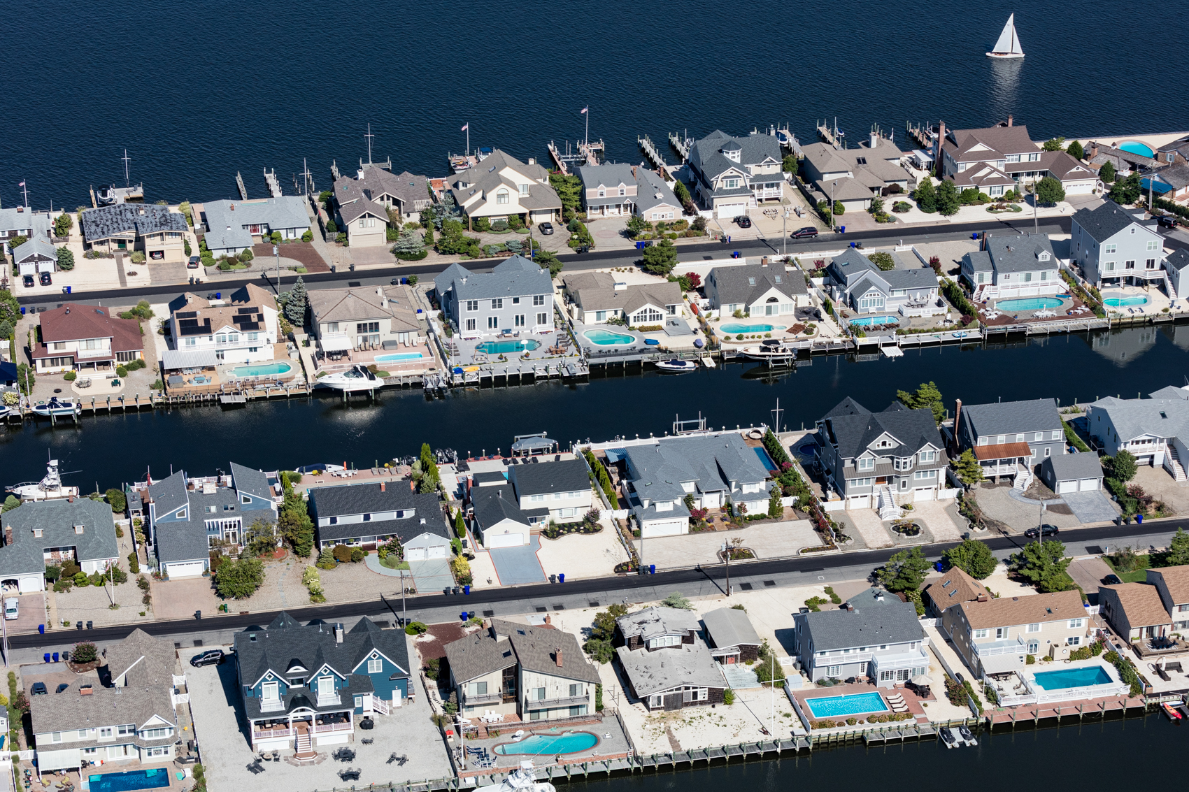 A dredged and filled development of second homes in Mantoloking, New Jersey, each with waterfront access and dockage.