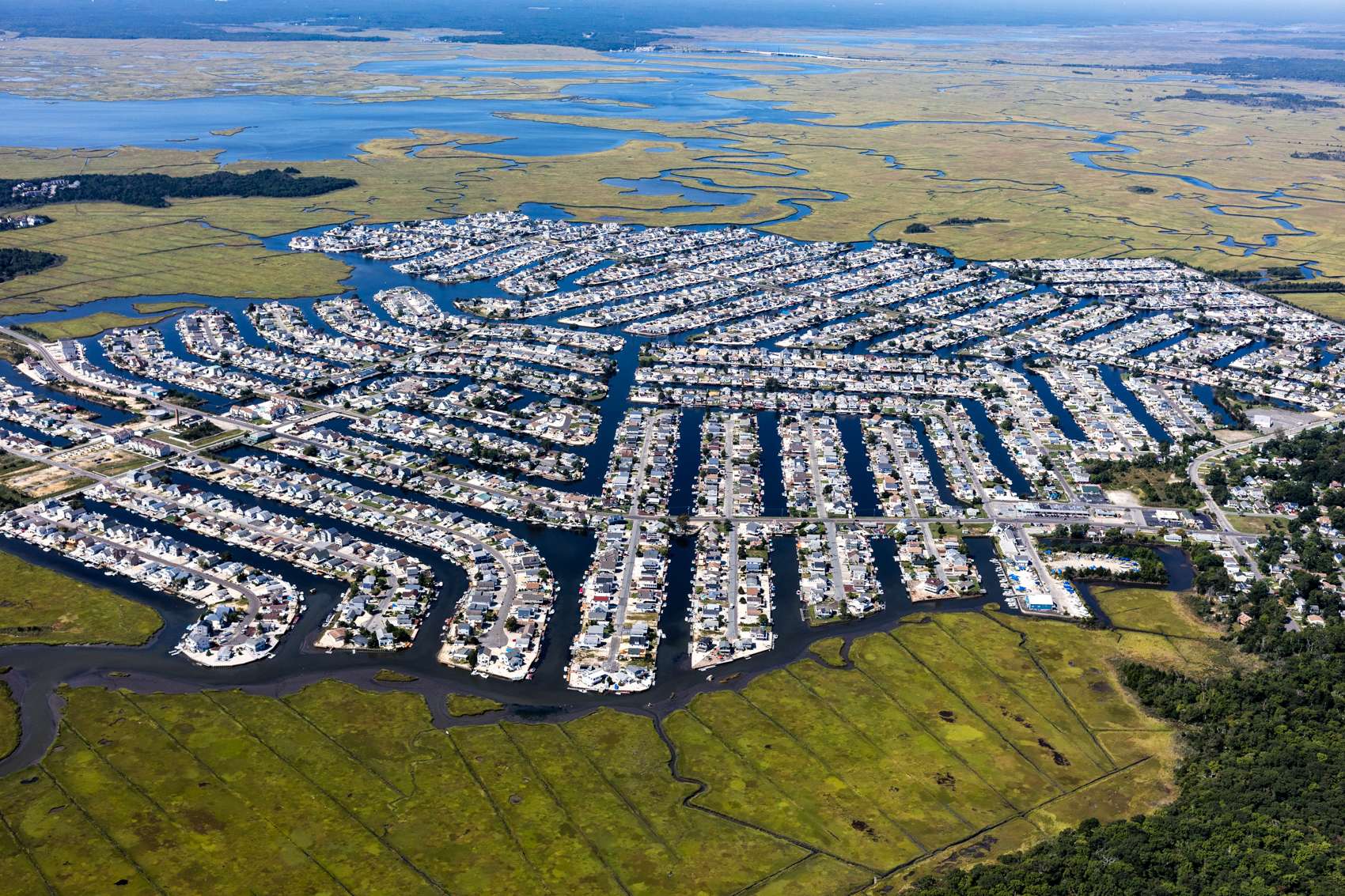 The Mystic Island neighborhood of Little Egg township, New Jersey is built on filled in wetlands. Today, it suffers from drops in home prices partially due to flood risk, an easy thought to have after Hurricane Sandy smashed through New Jersey in 2012.