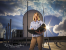 TEP Renewable Energy Forecasting/Trading Analyst Nicole Bell documents weather observations from equipment on the roof of the University of Arizona's ENR2 building. 