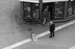 On June 6, 2023 Scartoni closes the newsstand for the afternoon as a man waits.  Scartoni says “Someday people will walk by [a newsstand] and say ‘what was that for?’ And others will say, ‘Oh, that's where they used to sell newspapers,’ nobody will know what newsstands are.”   