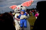Matthew Crusha, 2, cries while posing with the Easter Bunny for a photograph during part of the annual Imperial Oil and Plumbing Egg Hunt. The hunt was held at South Windsor High School and is conducted by South Windsor Recreation.