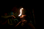 Megan Intfen learns how to swallow fire at the Coney Island Sideshow class. Intfen and other students learned to swallow fire as well as numerous other side show acts.  Intfen is from Brooklyn.