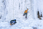 Sapana Rai, 14, left, and Susmita Limbu, 14, right, work their way up during an ice climb at Camp Alexander at Lake George, Colo. on Feb. 17, 2017. The camp is run by the Boy Scouts of America.