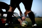 Rick Brainerd, 37, of Rocky Hill, is a member of the Hartford Wanderers rugby team - here he practices with the others at Colt Park in Hartford. The Wanderers were founded in the 1960's.