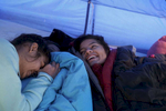 Laxmi Adhikari, 14, left, and Susmita Adhikari, 16, right, playfully talk to each other shortly after waking up after a night camping out at Bear Lake Campground in Lakewood, Colo. on Oct. 15, 2017.  