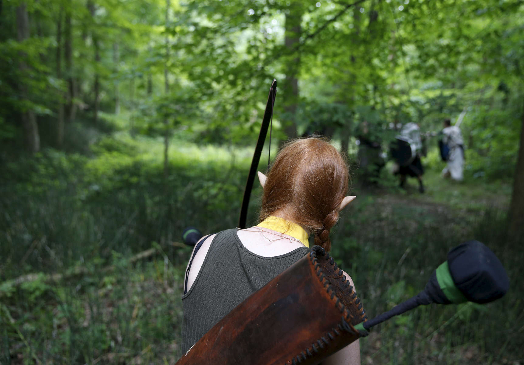 Slippery Rock, PA -- 6/22/2017 -  An elf quietly stalks her prey during a woods battle. The sport is called Dagorhir which means “Battle Lords” in Tolkien’s Elvish language. 