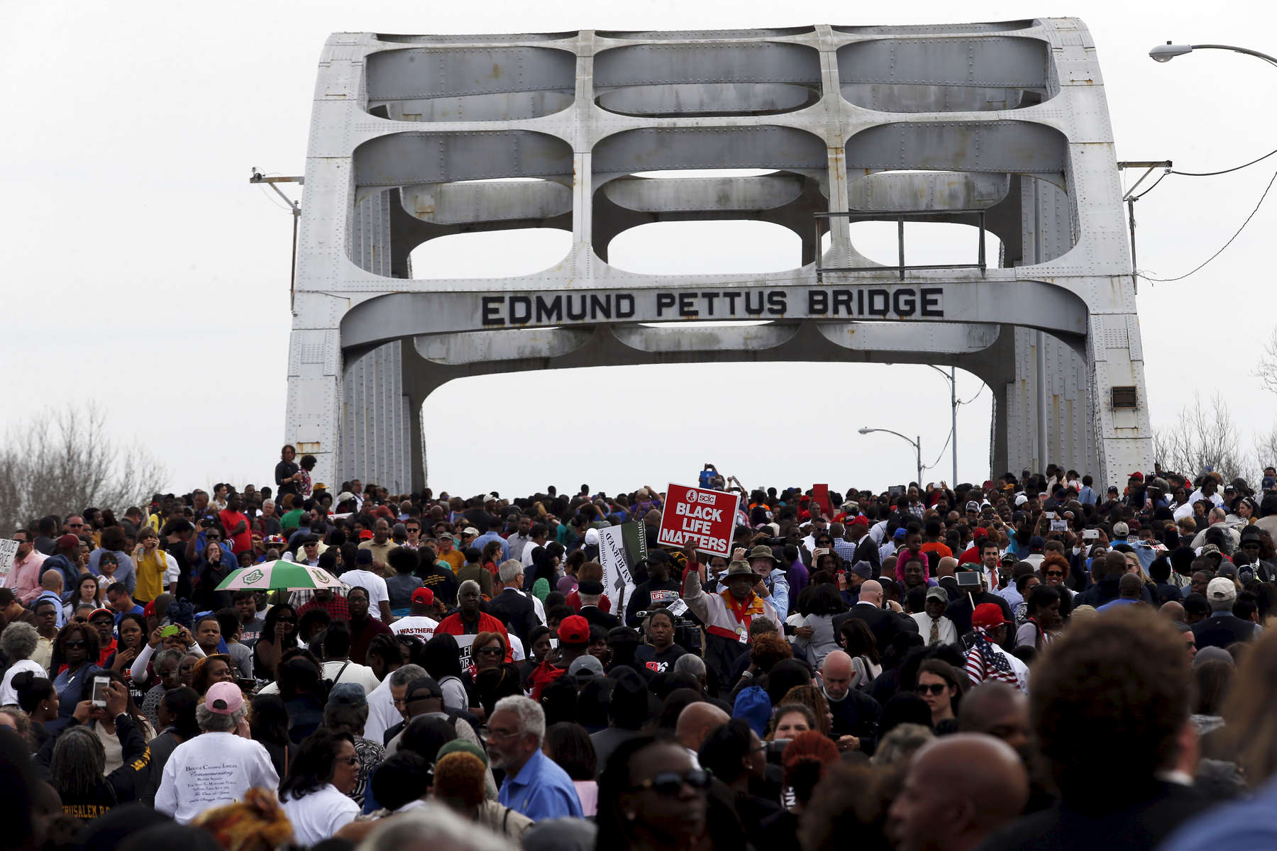 Selma, Alabama -- 3/08/2015-- Marchers retrace the steps of those who marched with Dr. Martin Luther King, Jr. 50 years ago over the Edmund Pettus Bridge in Selma, Alabama March 8, 2015. 