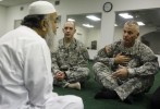 (L-R) Imam Syed Ahmed Ali, Chaplain Jason Palmer, and Chaplain Ira Houck talk at the Islamic Community Center in Killeen, Texas November 7, 2009. The Chaplains paid a visit to the Imam to extend an invitation to the memorial service being held on Tuesday, for victims of a mass shooting. Major Nidal Malik Hasan, the Army psychiatrist who is suspected of killing 13 people during the mass shooting at the Fort Hood Army post, attended prayer services at the Islamic Community Center.