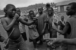 Tension rises between two boys in a camp for internally displaced people (IDP's) in Magunga, Demcratic Republic of Congo.  