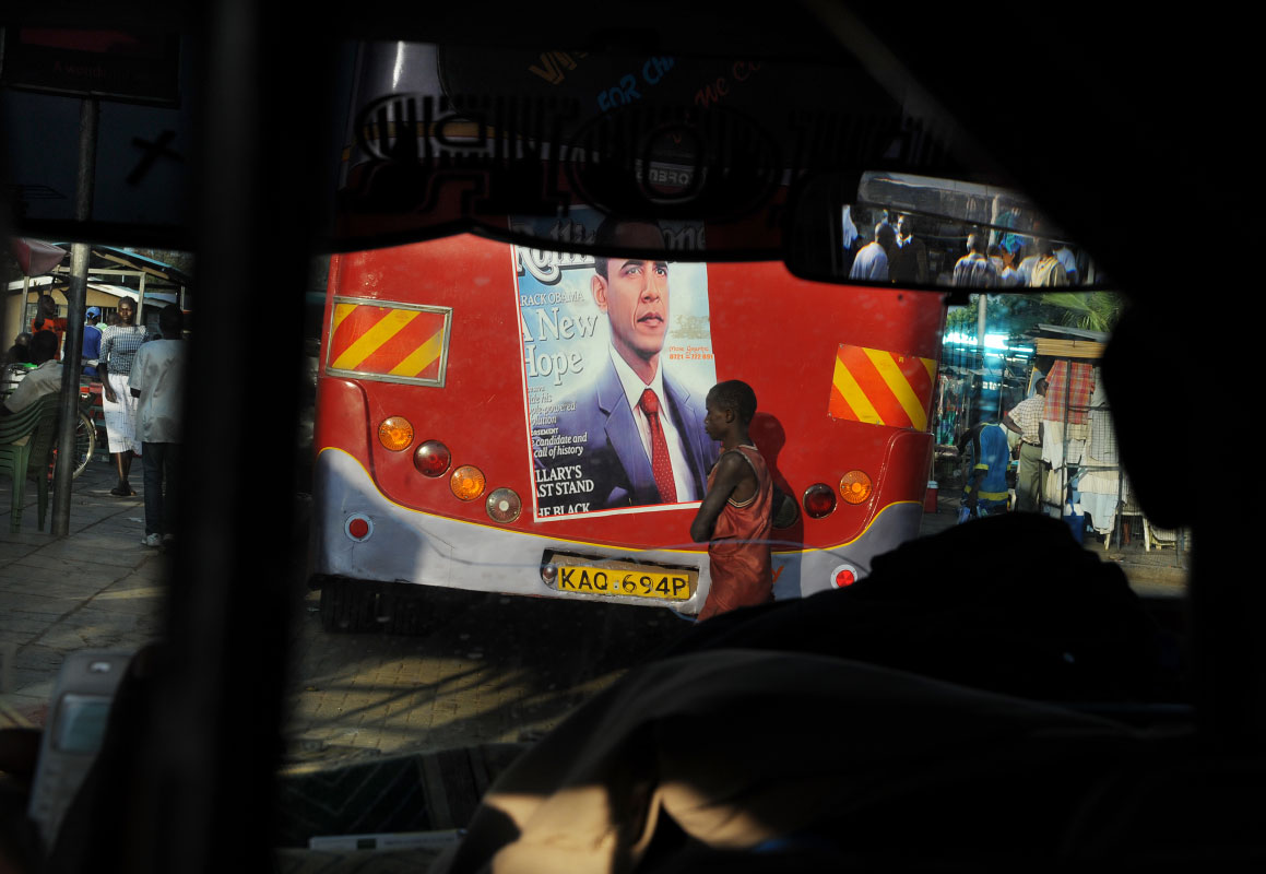 An image of president-elect Barack Obama is posted on the back of a bus.  Kisumu, the country's third largest city, sits on the northeast edge of Lake Victoria. 