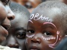 On the day of the inauguration of U.S. president-elect Barack Obama, a child's face is decorated where celebrations are taking place at the Jomo Kenyatta Sportsground.