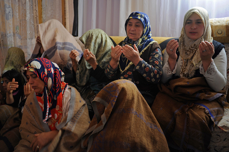 ALVAR, TURKEY.  Women sit for a reading of the Koran late morning in the home of Murat Ozturk in the village of Alvar, Erzurum region, Turkey, which is traversed by the Baku-Tbilisi-Ceyhan oil pipeline, on the first day of Ramadan, August 11, 2010.