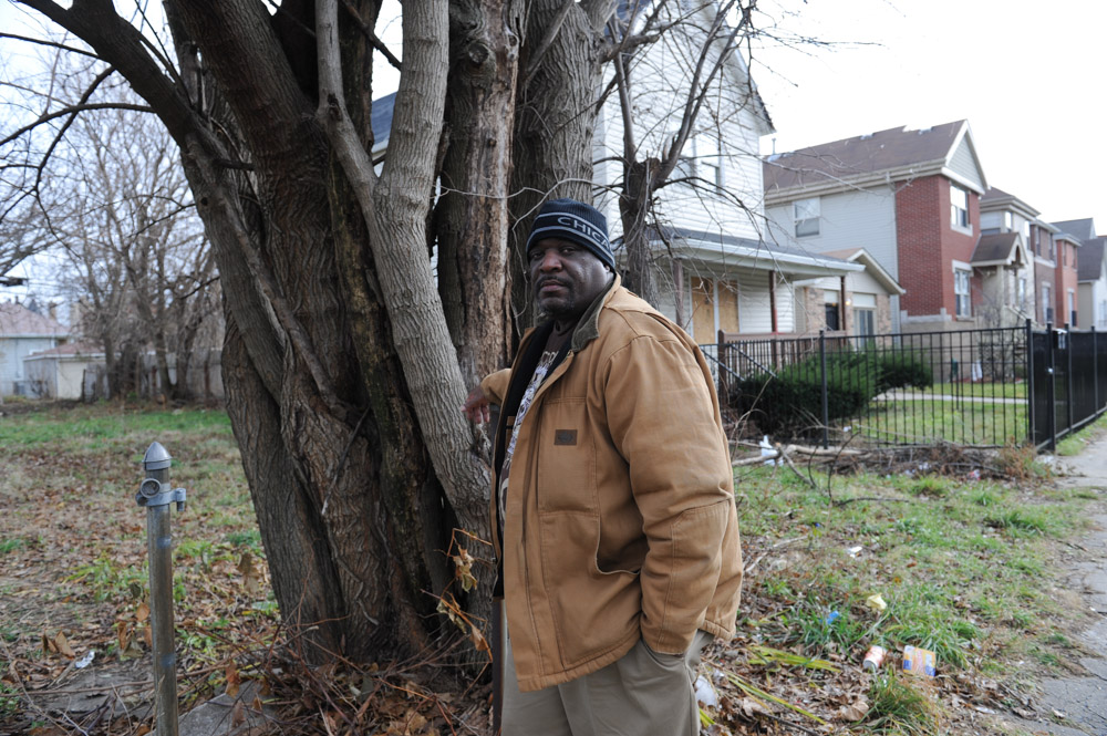CHICAGO, ILLINOIS. Marvin Reeves, 56, stands near the front of the house he bought for his daughter in the Greater Grand Crossing neighborhood on November 29, 2015.  Reeves purchased and renovated the house with money he received in settlement from the City of Chicago after a codefendant, Ronald Kitchen, and he were both tortured and Kitchen confessed to a crime both were innocent of; Reeves spent 21 years incarcerated from 1988-2009 for a South Side arson that killed two women and three children and had received five consecutive life sentences. 