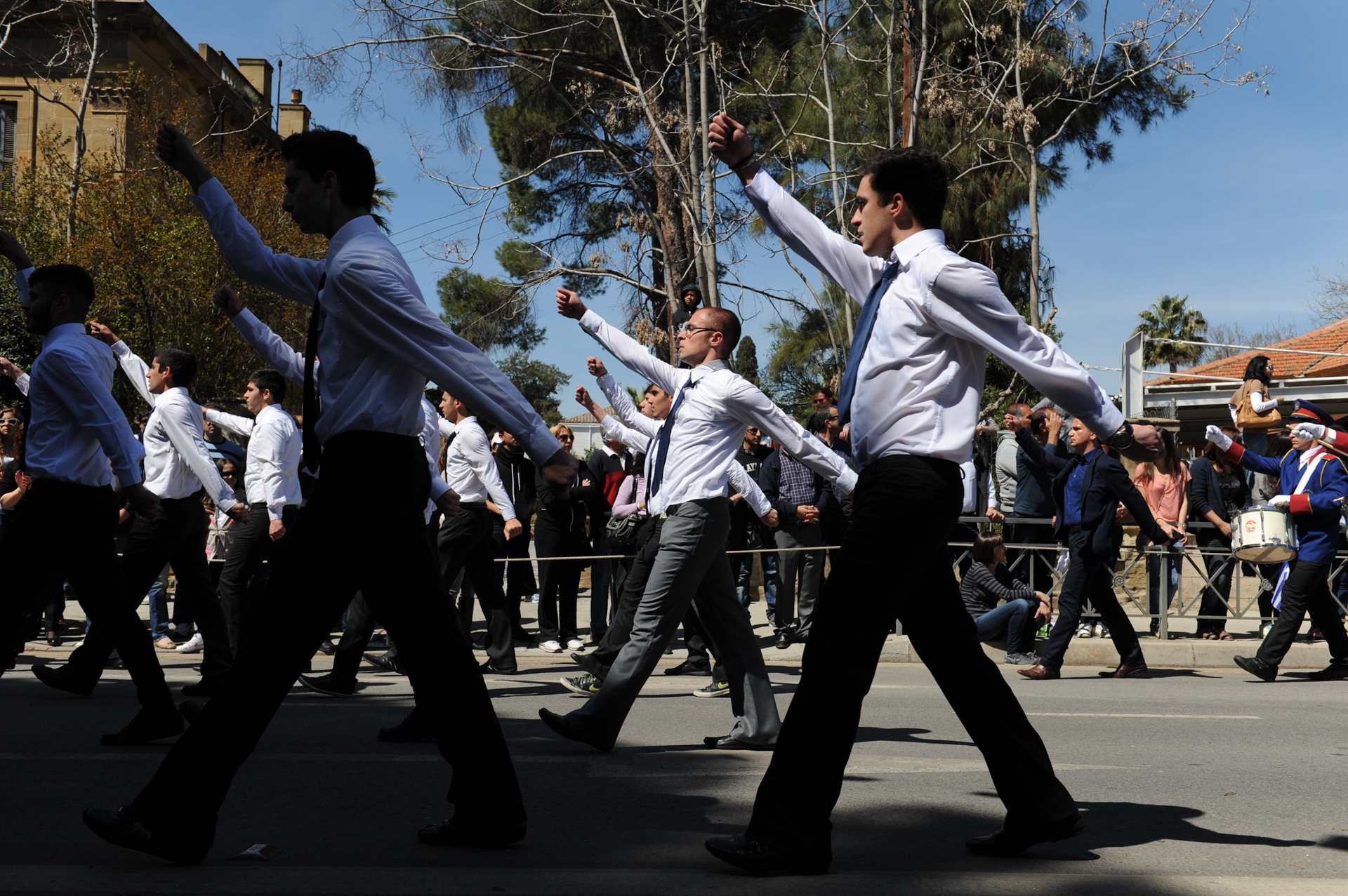 NICOSIA, CYPRUS.  Men are seen marching in the Cypriot National Day military parade on March 25, 2013. Late last night, the IMF, the EU and the Cypriot government reached a deal to rescue the Cypriot banking sector and economy by imposing capital controls, but many are fearful of what the week may have in store as Cypriots look to withdraw their savings from the bank and much of Greek Cyprus has converted to a cash only economy.