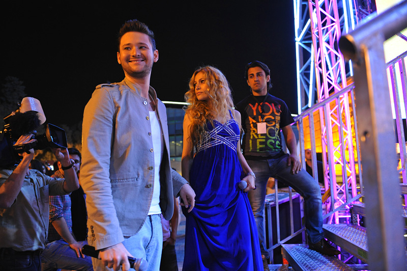 BAKU, AZERBAIJAN.  Eldar Gasimov and Nigar Jamal of {quote}Ell and Nikki,{quote} winners of the Eurovision Song Contest in 2011 which earned Baku the right to host this year's contest, stand side stage before performing at the Eurovision Fan Club concert on the Bulvar seaside promenade on April 29, 2012.