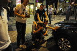 PRAGUE, CZECH REPUBLIC.  Stag night tourist Angelo Eleveld, 22, of Rotterdam, the Netherlands feels sick mid-way through the night as his friends alternatively seek to comfort and tease him while locals look on in consternation on Weneslaus Square in Prague, Czech Republic on August 12, 2011.  Michael Klos, 23, whose wedding a few weeks later was the occasion for the trip to Prague to celebrate his last nights of freedom, has his arm around his friend.