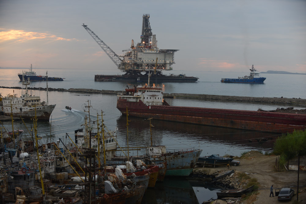 BAKU, AZERBAIJAN.  After two years of construction, a barge hauls the West Chirag offshore oil platform, operated by BP, out into the Caspian Sea in the Bibi Heybat district on September 12, 2013.  The platform will be operational by December 2013 and will see its first returns of crude oil in the spring of 2014.
