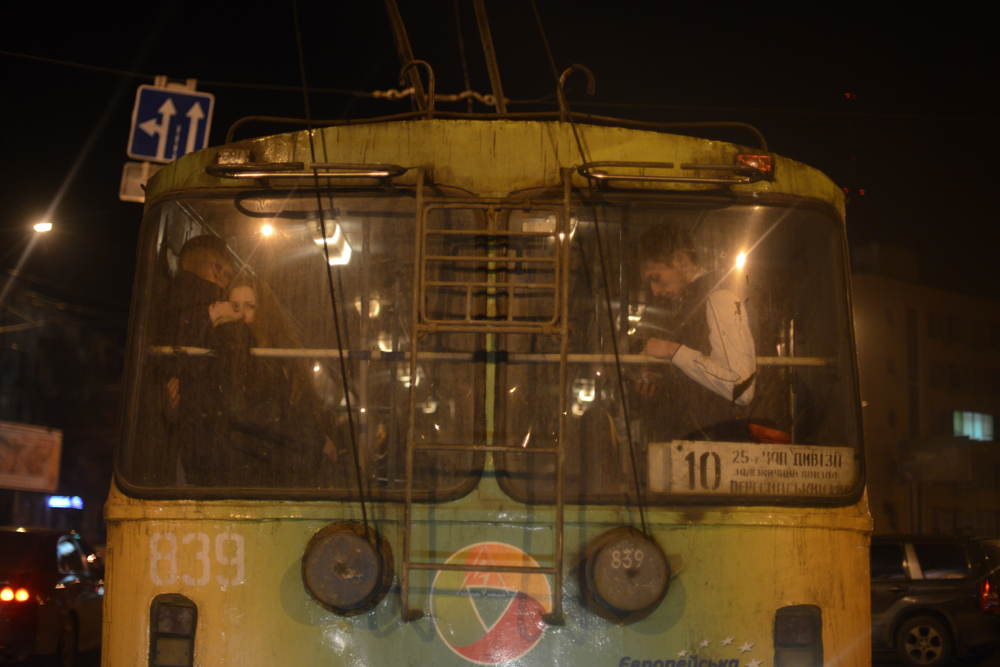 ODESSA, UKRAINE.  A couple and a young man ride the trolley bus on Valentine's Day on February 14, 2016.