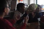 CHICAGO, ILLINOIS.  Fourth graders in Ms. Ramirez's class pass around a cabbage from the family-owned DeGroot Farms at the Nathanael Greene Elementary School in the McKinley Park neighborhood on December 19, 2014.  DeGroot Farms sells to Aramark which in turn has a contract to serve Chicago Public Schools.