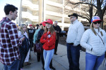 CHICAGO, ILLINOIS. Supporters of Republican Presidential front runner Donald Trump wait in line on the University of Illinois Chicago (UIC) campus to hear Trump speak at an event scheduled for the early evening on March 11, 2016.  Trump cancelled the event citing a request from the Chicago Police after scuffles broke out between his supporters and protesters, who had claimed a large number of the seats, before he was to speak, something the Chicago Police denied, which maintain they were ready to work the whole night.