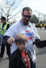 JANESVILLE, WISCONSIN.  A supporter of Republican presidential frontrunner Donald Trump combs his son's hair as they wait in line to enter before a town hall at the Holiday Inn Express on March 29, 2016.  Father told son, {quote}Let me comb your hair son before we meet the next president of the United States.{quote}