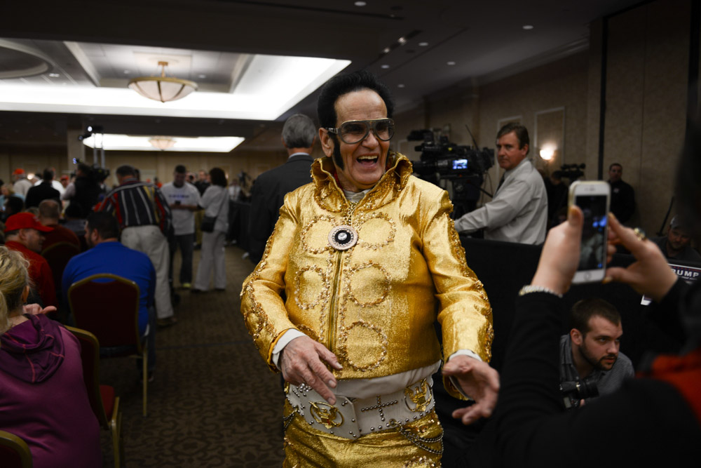 APPLETON, WISCONSIN.  A supporter of Republican presidential frontrunner Donald Trump in an Elvis costume before Trump speaks at the Radisson Paper Valley Hotel on March 30, 2016.