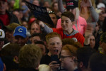 BLOOMINGTON, ILLINOIS.  Supporters of Republican Presidential front runner Donald Trump react to protesters during his speech at the Synergy Flight Center on March 13, 2016.  Protests have become a regular feature of Donald Trump rallies, contributing in their way to the spectacle and circus-like environment.