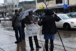 APPLETON, WISCONSIN.  A protester is interviewed in front of the Radisson Paper Valley Hotel before Republican presidential frontrunner Donald Trump speaks on March 30, 2016.