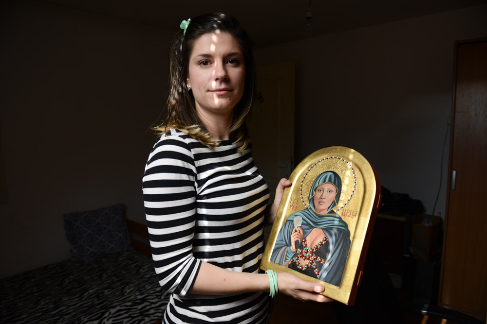 NIS, SERBIA.  Vladislava Djuric, 30, holds her nationally famous icon of Svetlana Raznatovic, better known as Ceca, which garnered national headlines after pictures went viral of it taken during a student exhibition at Djuric's university, on July 10, 2015.  Ceca, a turbofolk star better known as {quote}the Mother of Serbia,{quote} was married to one of the Bosnian War's most notorious Serbian military commanders, Arkan, who was later assassinated, and was one of a rotating cast of turbofolk stars who gave daily concerts in Belgrade's Republic Square during the 1999 NATO bombing.