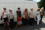 BELGRADE, SERBIA.  Members of the studio audience wait to enter the studio for a taping of {quote}Zvezde Granda,{quote} or {quote}Grand Stars,{quote} a premier turbofolk showcase on Serbian television, on July 1, 2015.  Members of the studio audience are paid 500 dinars, approximately $5, a day for their role and participation in the tapings which last for hours.