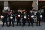 BELGRADE, SERBIA.  Serbian police in riot gear stand guard outside the Media Centar before a commemoration of the 20th anniversary of the Srebrenica massacre, widely labeled genocide in the eyes of International Criminal Court in The Hague and the international community, on July 11, 2015.  Due to threats from nationalists, a planned die-in intended to represent the 8,000 who lost their lives in Srebrenica, Europe's largest postwar massacre, was cancelled and a much smaller commemoration of NGO officials was held at the Media Centar.