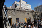 DIYARBAKIR, TURKEY.  Men pray outside the Nebi mosque, an official Turkish mosque with an imam approved by the Turkish state, during Friday prayers on February 24, 2012.