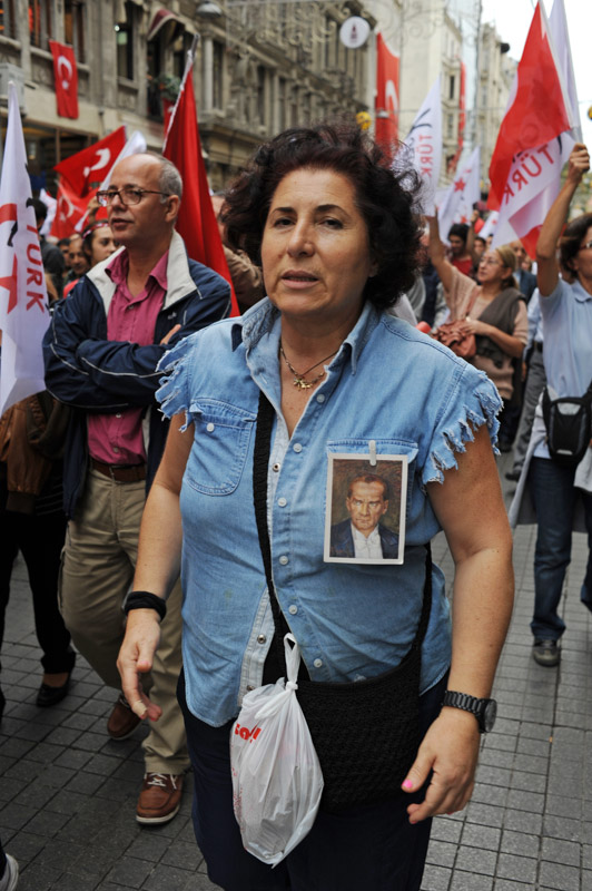 ISTANBUL, TURKEY.  A nationalist demonstrator marces up Istiklal Caddesi from Tunel in support of Ataturk's principles of a secular republic and against the ruling Justice and Development Party, AKP in Turkish, on Republic Day on October 29, 2012.