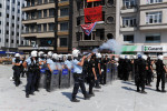 ISTANBUL, TURKEY.  Police fire tear gas at demonstrators on the road and into Gezi Park from Taksim Square as they move on the square on June 11, 2013. After 10 days of protest and occupying Gezi Park adjacent to Taksim Square, riot police moved to retake the square; last night, the Prime Minister called a meeting for tomorrow with protest leaders.