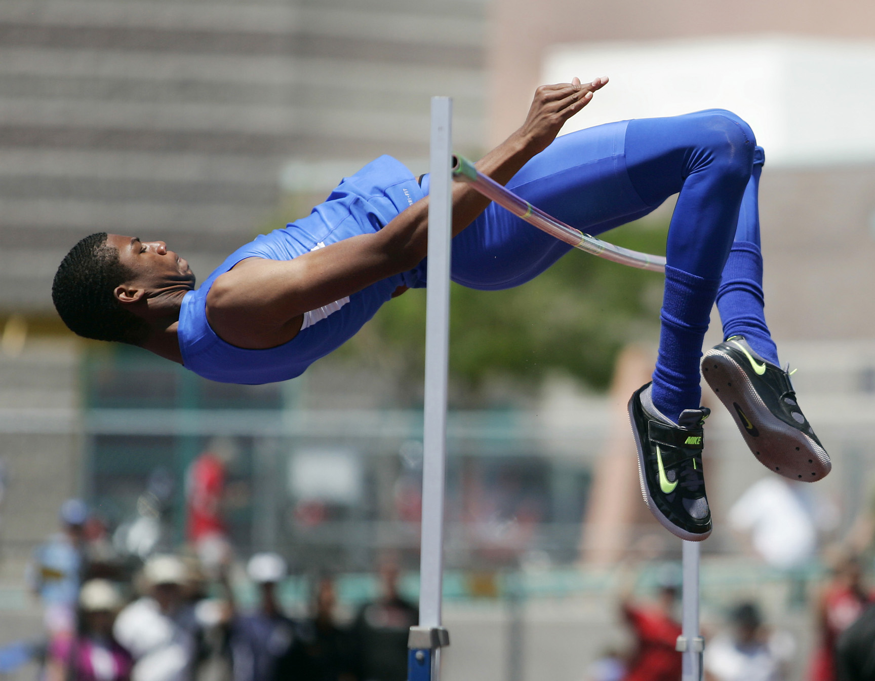 Bishop Gorman’s junior Randall Cunningham successfully completes the 7’ 3 ¼” high jump breaking national record at the state track meet hosted by Silverado High School Saturday, May 18, 2013, in Las Vegas.