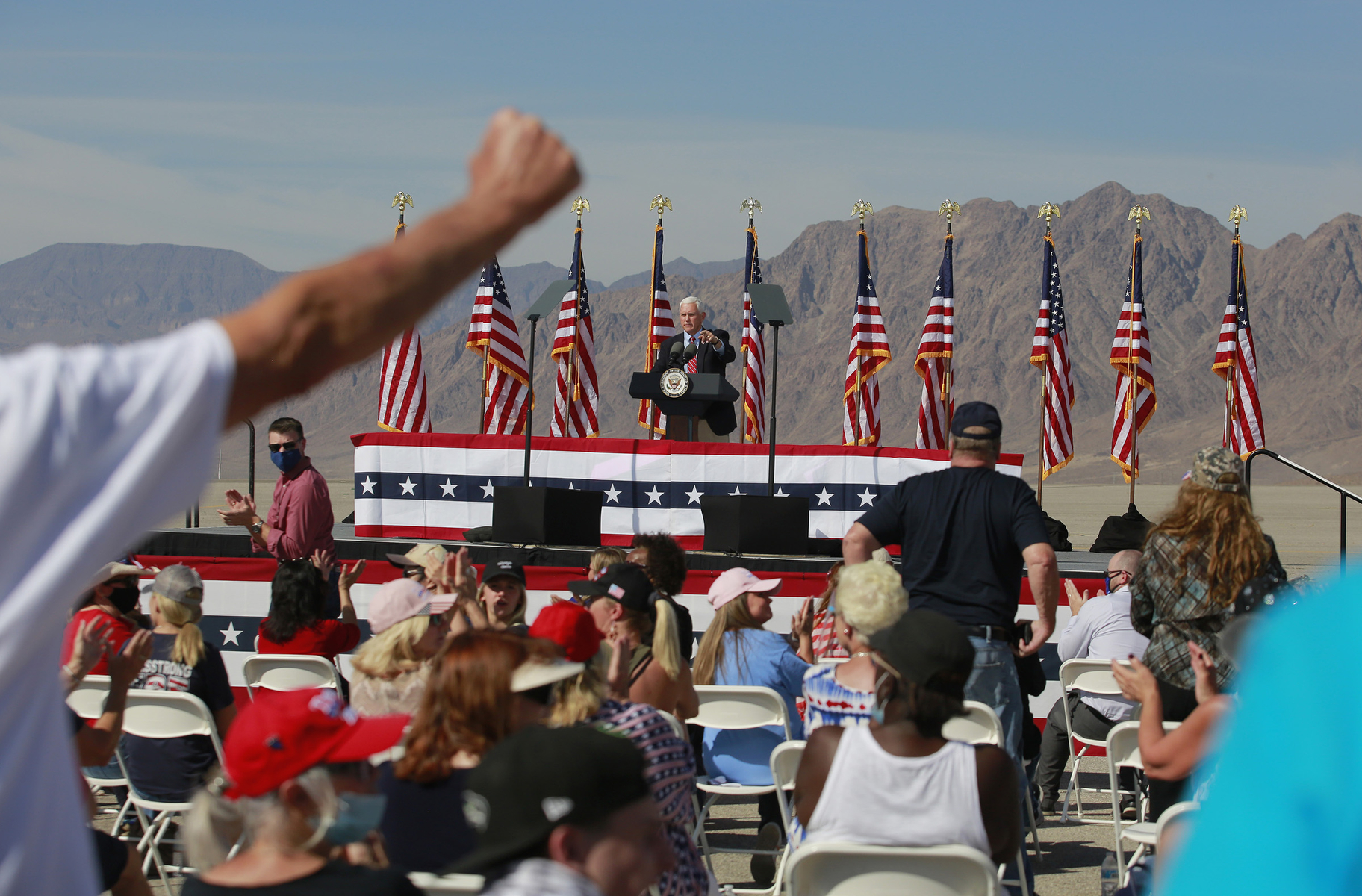 Supporters listen to Vice President Mike Pence speak at a GOP rally Thursday, October 8, 2020, in Boulder City, Nevada. (Photo by Ronda Churchill/AFP)