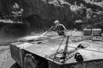 Miner Robert Head cleaning off his rock dust car at the Osaka mine, Appalachia, VA. 