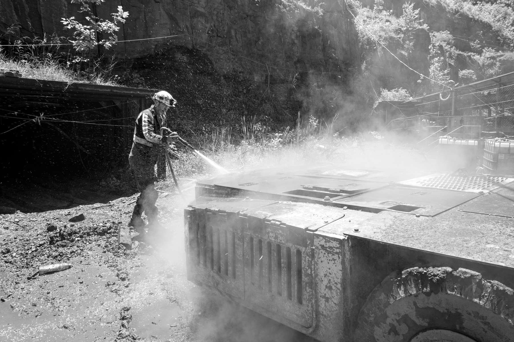 Coal miner Robert Head hosing down his rock dust car at the Osaka mine, Appalachia, VA. 