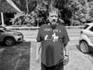 James standing outside his house in the unincorporated hollow of Micco, WV. 