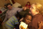 © 2010 Harvard University. Adoptive parents with their children at home in Somerville, MA.