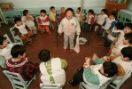 Young children play a game at the Children's Welfare Institute in Hefei.