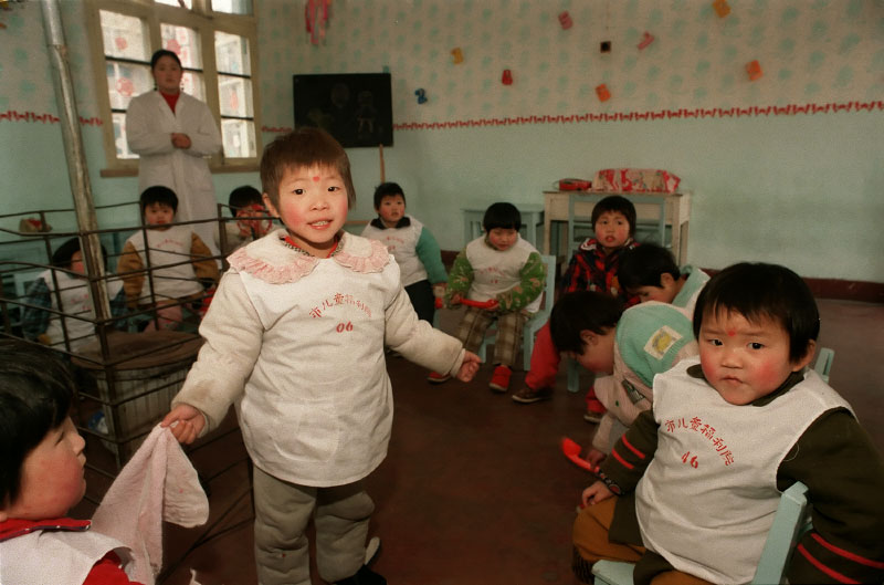 Young children who are probably too old to be adopted by parents wanting infants, at the Children's Welfare Institute in Hefei.