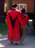 © 2010 Harvard University. Harvard graduate leaving Commencement ceremonies with his mother.