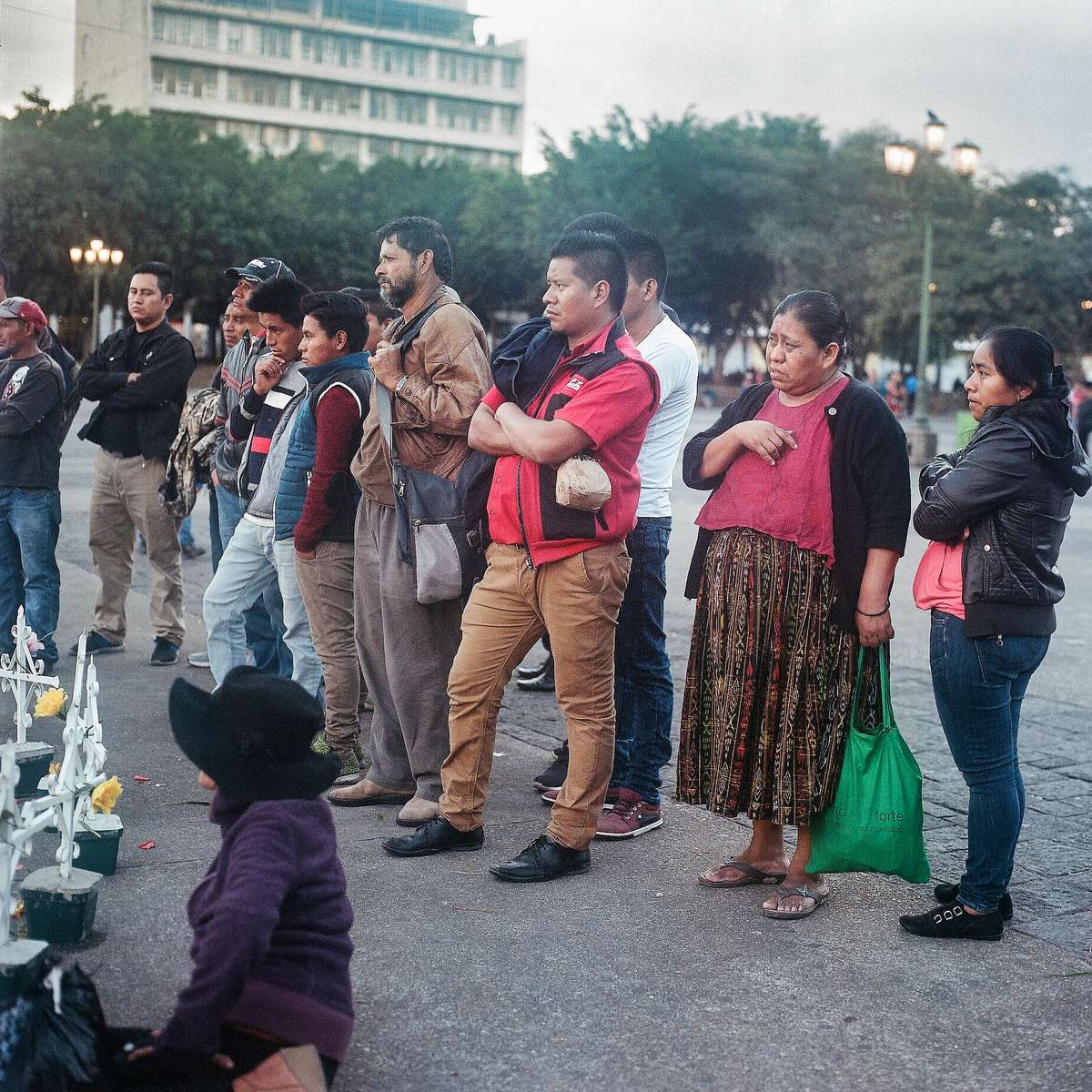 GUATEMALA CITY - FEB. 08, 2018 Guatemalans watch as activists and family members perform a Mayan ceremony for the 41 girls that were killed in a fire at a state-run youth shelter last year, March 8, at the Plaza de la Constitución in Guatemala City.56 girls had been locked inside a room as punishment for organising a protest the day before against cramped conditions and abuse by staff. When the staff wouldn't allow them to use the bathroom after six hours, three girls lit a mattress on fire, which quickly spread into an inferno.15 survived. 